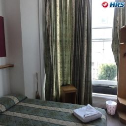 Habitación Kensington Suites Fotos