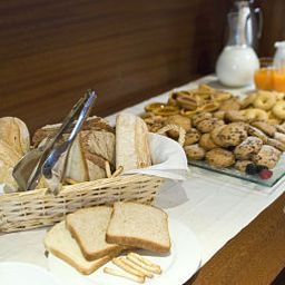 Sala colazione nel ristorante As Hotel Cambiago Fotos