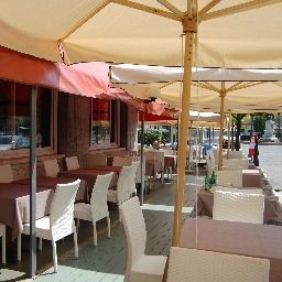 Breakfast room within restaurant Ambra Fotos