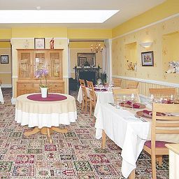 Sala colazione nel ristorante Buckinghams Fotos