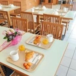 Frühstücksraum Sejours & Affaires Leonard de Vinci Apparthotel Fotos