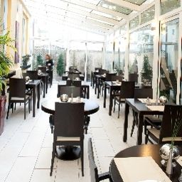 Salle du petit-déjeuner BEST WESTERN PLUS Grand Hotel Victor Hugo Fotos