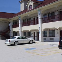 Außenansicht Scottish Inns & Suites Sam Houston Pkwy. Fotos