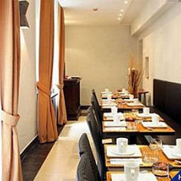 Salle du petit-déjeuner située dans le restaurant Galatea Fotos