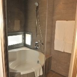 Camera da bagno E-Hotel Fotos