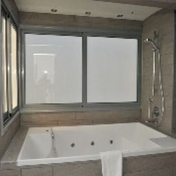 Camera da bagno E-Hotel Fotos