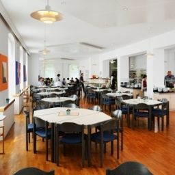 Sala colazione nel ristorante St. Bernhard Wohnen & Tagen Fotos