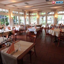 Salle du petit-déjeuner située dans le restaurant Dreimädelhaus Haus Oerdekenbrück Fotos