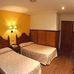 Habitación Comillas Fotos