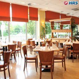 Breakfast room within restaurant Grand City East Fotos