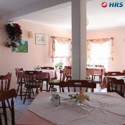 Salle du petit-déjeuner située dans le restaurant Hansen Pension Fotos