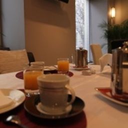 Frühstücksraum De Lux Pension Fotos
