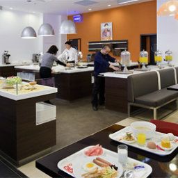 Sala de desayuno en el restaurante ibis Beijing Sanyuan Fotos