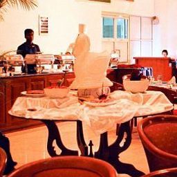 Breakfast room within restaurant Global Towers Hotel & Apartments Fotos