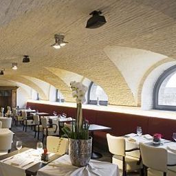 Salle du petit-déjeuner située dans le restaurant Het Godshuis Fotos