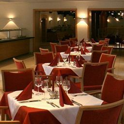 Sala de desayuno en el restaurante Hubertus Ferien- und Aktivhotel Fotos