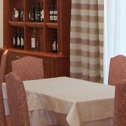 Salle du petit-déjeuner située dans le restaurant Albergo Duomo Residenza Fotos