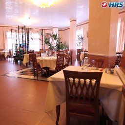 Salle du petit-déjeuner située dans le restaurant Borghetti Fotos