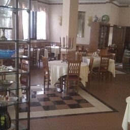 Salle du petit-déjeuner située dans le restaurant Borghetti Fotos