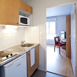 Küche Sejours et Affaires Annecy Le Pont Neuf Apparthotel Fotos