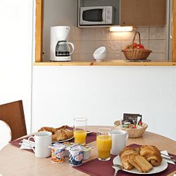 Küche Sejours et Affaires Annecy Le Pont Neuf Apparthotel Fotos