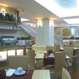 Salle du petit-déjeuner située dans le restaurant Hotel Lisboa Tejo Fotos