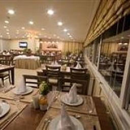 Salle du petit-déjeuner située dans le restaurant Grand Ünal Fotos