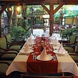 Salle du petit-déjeuner située dans le restaurant Plavi Zamak Fotos