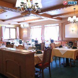 Salle du petit-déjeuner située dans le restaurant Almhof Danler Fotos