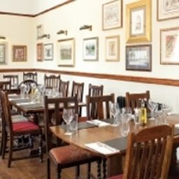 Salle du petit-déjeuner située dans le restaurant Penny Street Bridge Fotos