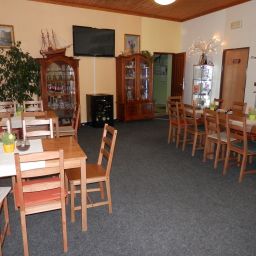 Frühstücksraum im Restaurant Mona Fotos