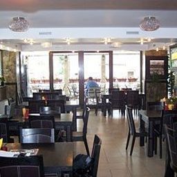Breakfast room within restaurant Avis Fotos