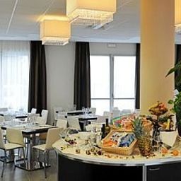 Breakfast room within restaurant Fiera Fotos