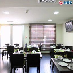 Sala colazione nel ristorante Le Cousture Citotel Fotos