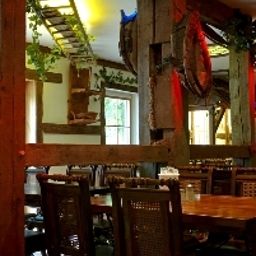 Salle du petit-déjeuner située dans le restaurant Harzlodge Fotos