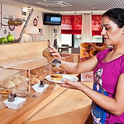Sala colazione nel ristorante ibis Porto Centro Fotos