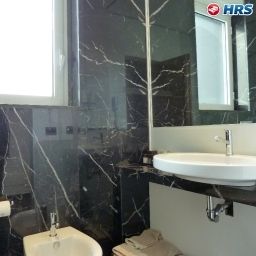 Camera da bagno Romano House Fotos