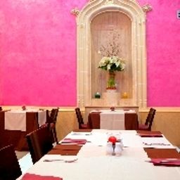 Salle du petit-déjeuner située dans le restaurant Itaca Jerez Fotos