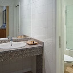 Camera da bagno Regency Suites Fotos