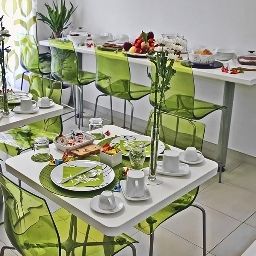 Sala colazione Suite Inn Fotos