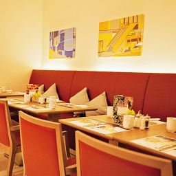 Salle du petit-déjeuner située dans le restaurant Ramada Encore Vienna City Center Fotos