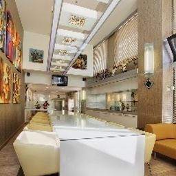 Sala de desayuno Jazz Hotel Fotos