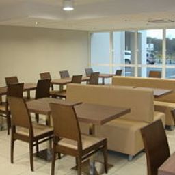 Salle du petit-déjeuner située dans le restaurant Arena Fotos