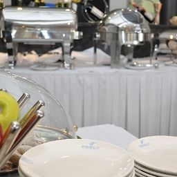 Sala de desayuno en el restaurante Perla Fotos