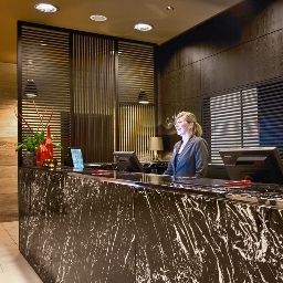 Reception Adina Apartment Hotel Fotos