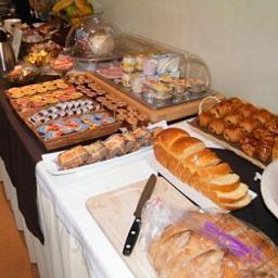 Sala colazione nel ristorante Saint Thegonnec Logis Fotos