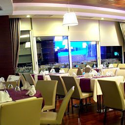 Salle du petit-déjeuner Alba Fotos