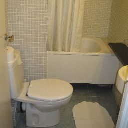 Camera da bagno Baires Hostal Fotos