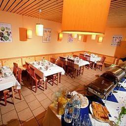 Sala de desayuno en el restaurante JUFA Schladming Fotos