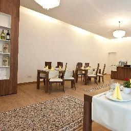 Sala de desayuno Apart Suites Fotos
